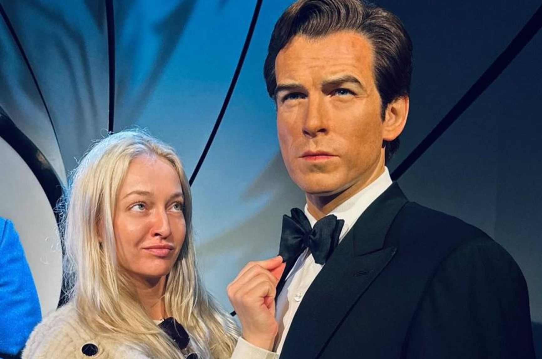 Melnikava and a wax figure of James Bond (Pierce Brosnan) in London