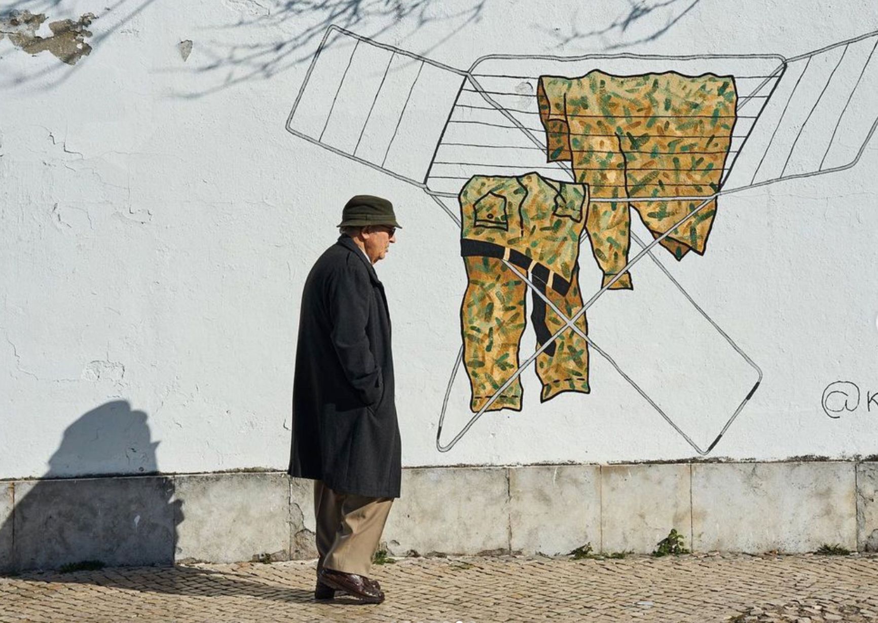 THE WAR IS NOT YET OVER, by artist @kuril.chto - Lisbon, 24.02.2023