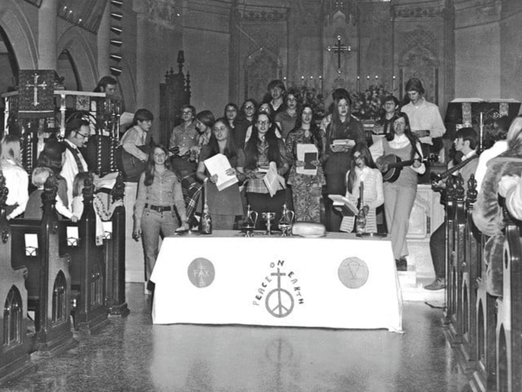 Folk singers at a guitar mass, 1970s