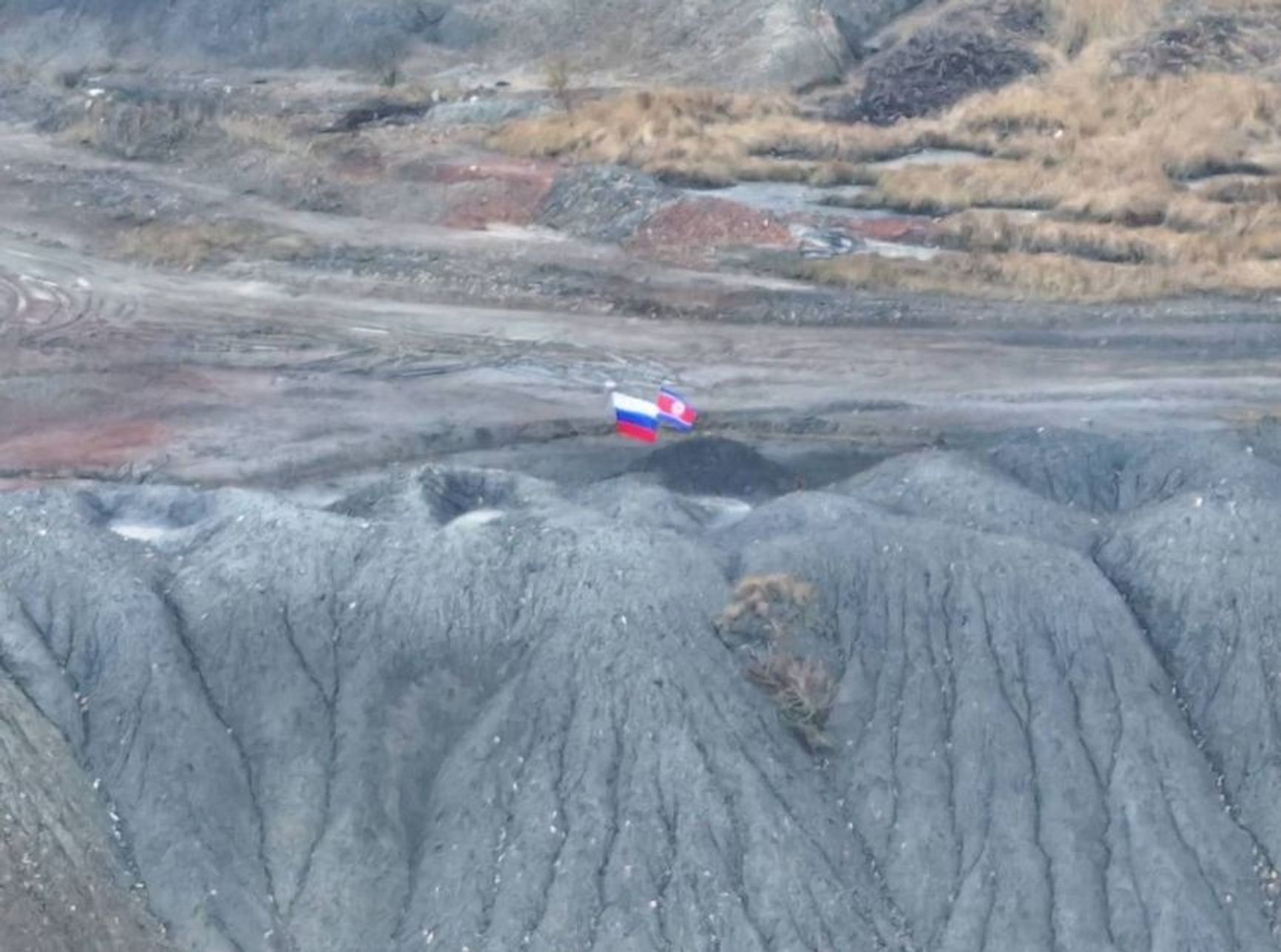 Russian and North Korean flags spotted on a mine dump near Pokrovsk in October 2024.